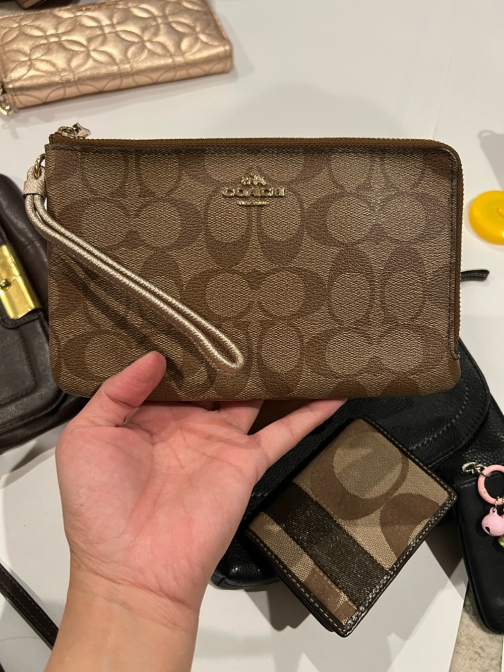 Coach Signature large Canvas Wristlet in Brown